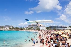 a plane coming in to land in St Maarten