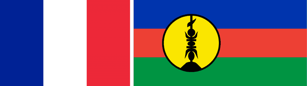 flags of New Caledonia - a local one and the French tricolour.