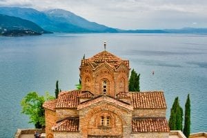 an ancient building overlooking the water in Ohrid, Macedonia