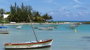 Cap Malheureux, small boats moored up on a tranquil Indian Ocean cove in Mauritius