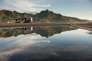 The airport on American Samoa with an aircraft carrier on the tarmac