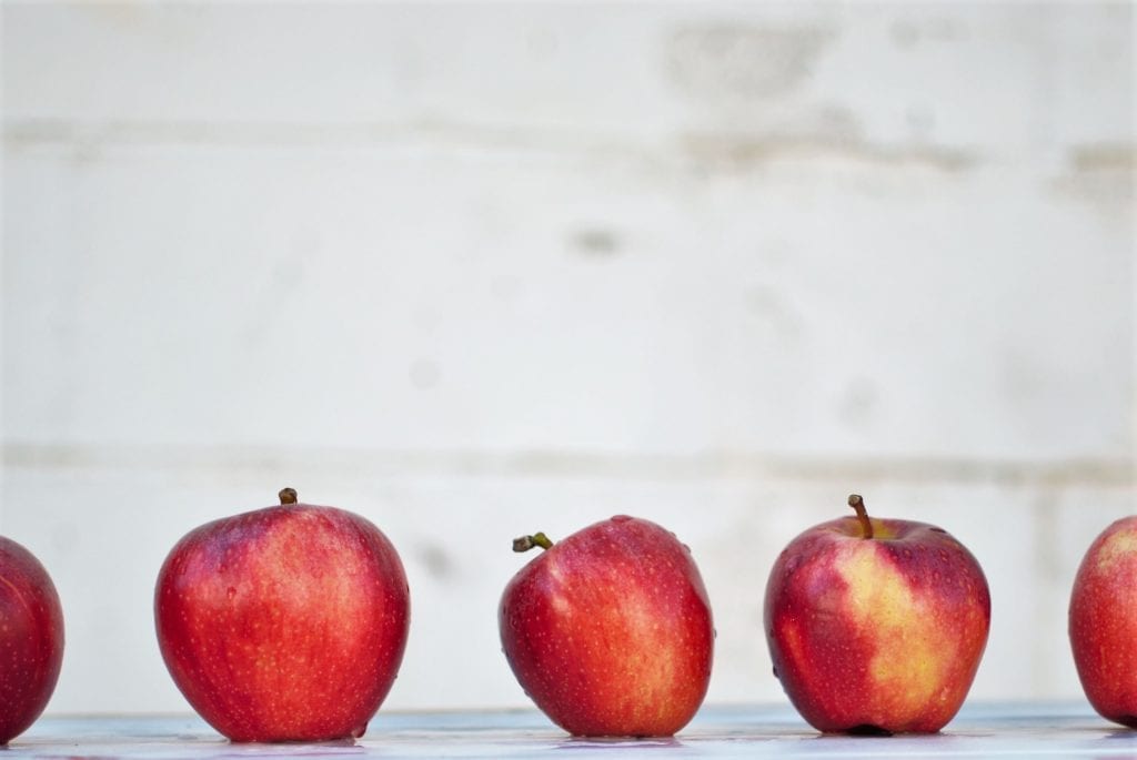 a row of red apples