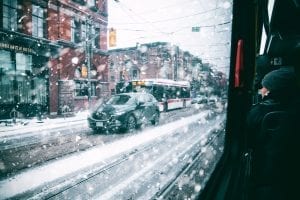 car driving through a blizzard