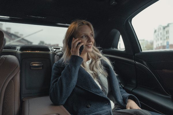 woman on a call inside her car