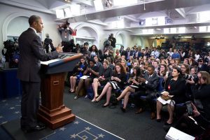 President Obama holding a press meeting