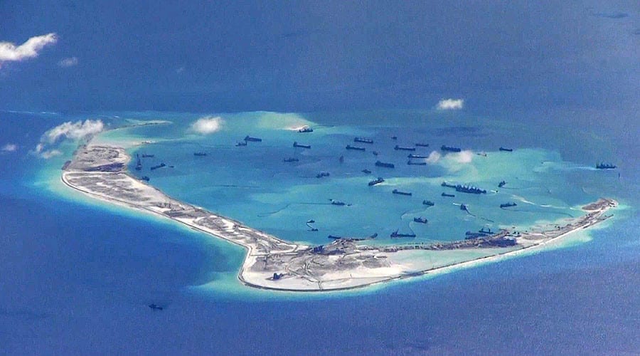 Subi Reef, an artificial island built by China, showing many vessels and much activity