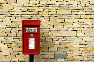 A red Royal Mail post box