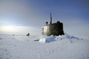 a submarine breaking though Arctic ice