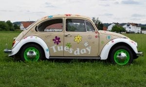 VW Beetle with the word 'Tuesday' over it