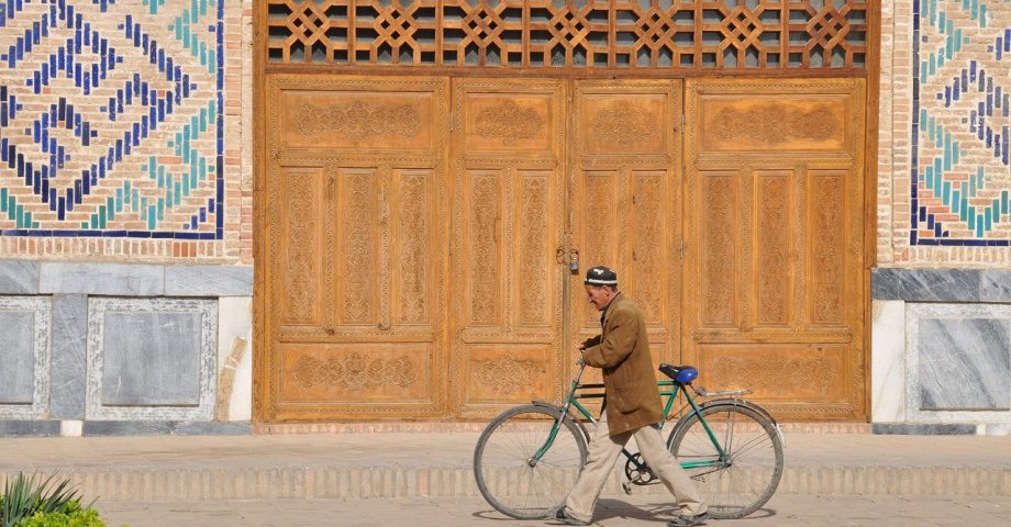 man with bike, Uzbekistan