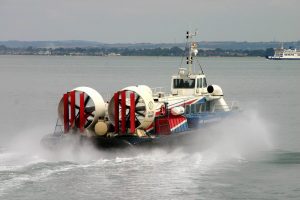 a hovercraft on the sea, going towards the Isle of Wight, England