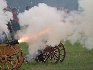 An English Civil War reenactment with canon firing