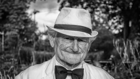 Old man wearing a fedora hat