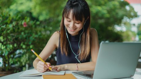 girl writing an essay